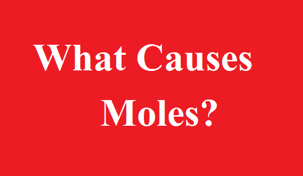 what causes moles